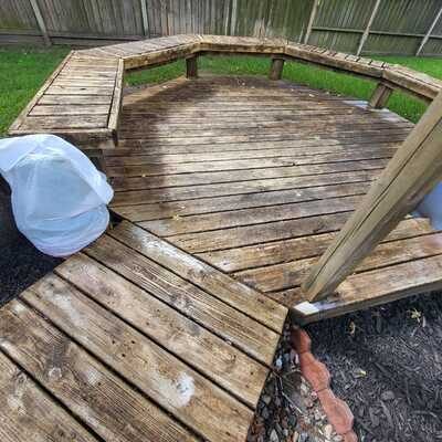 Deck before washing — dark weathered wood